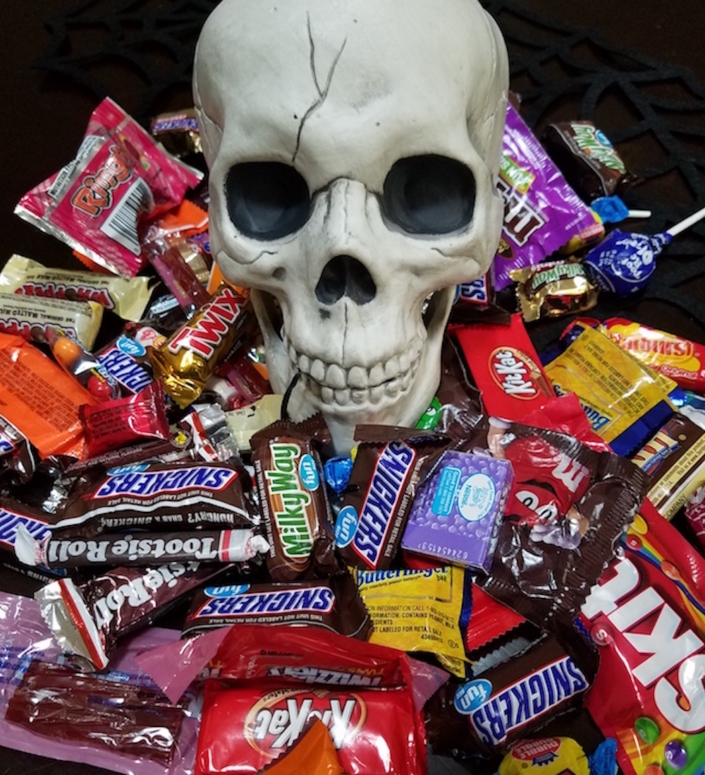 Halloween candy and skull