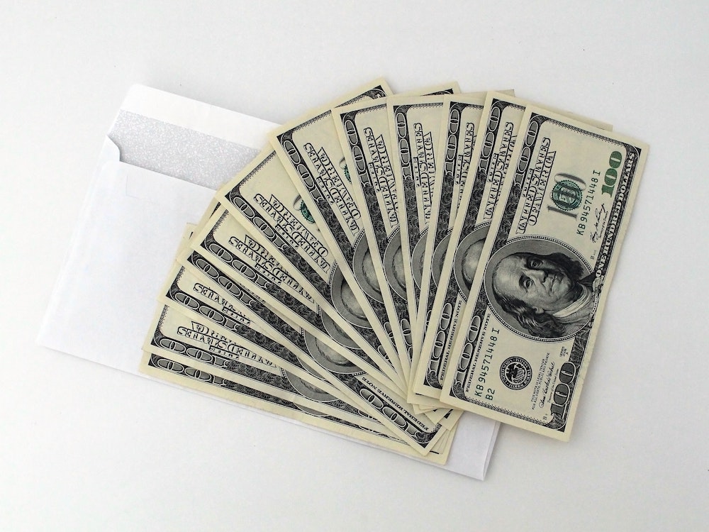 Cash on envelope