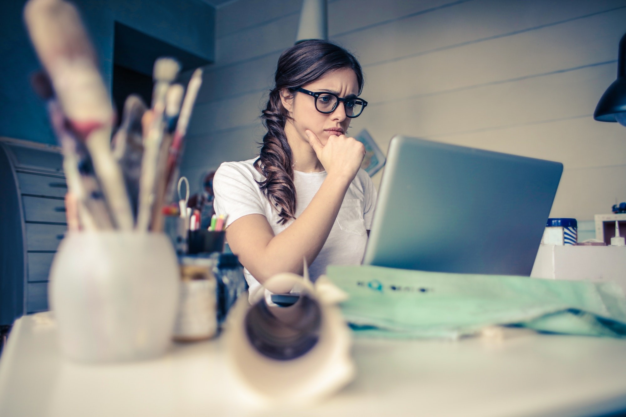 Girl looking at laptop