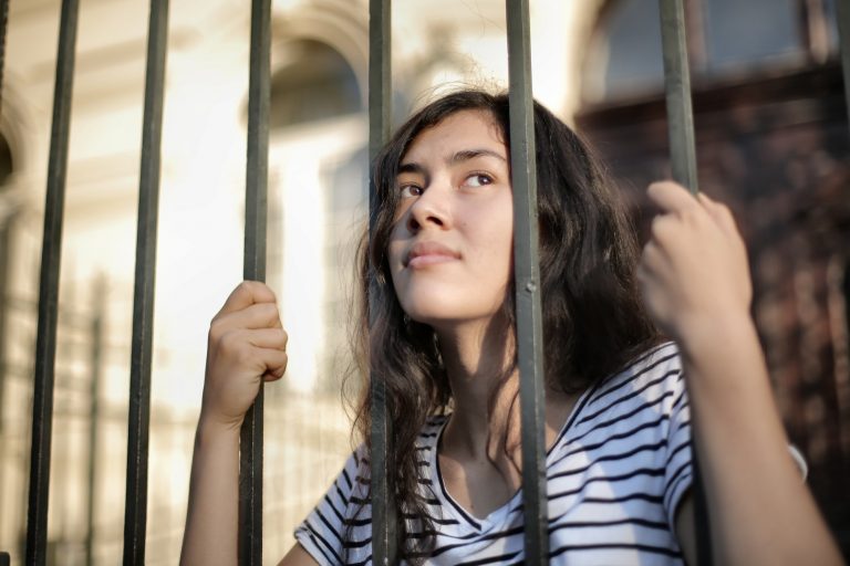 woman at gate