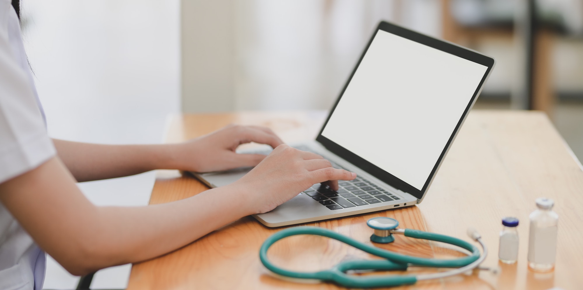 Laptop and stethoscope