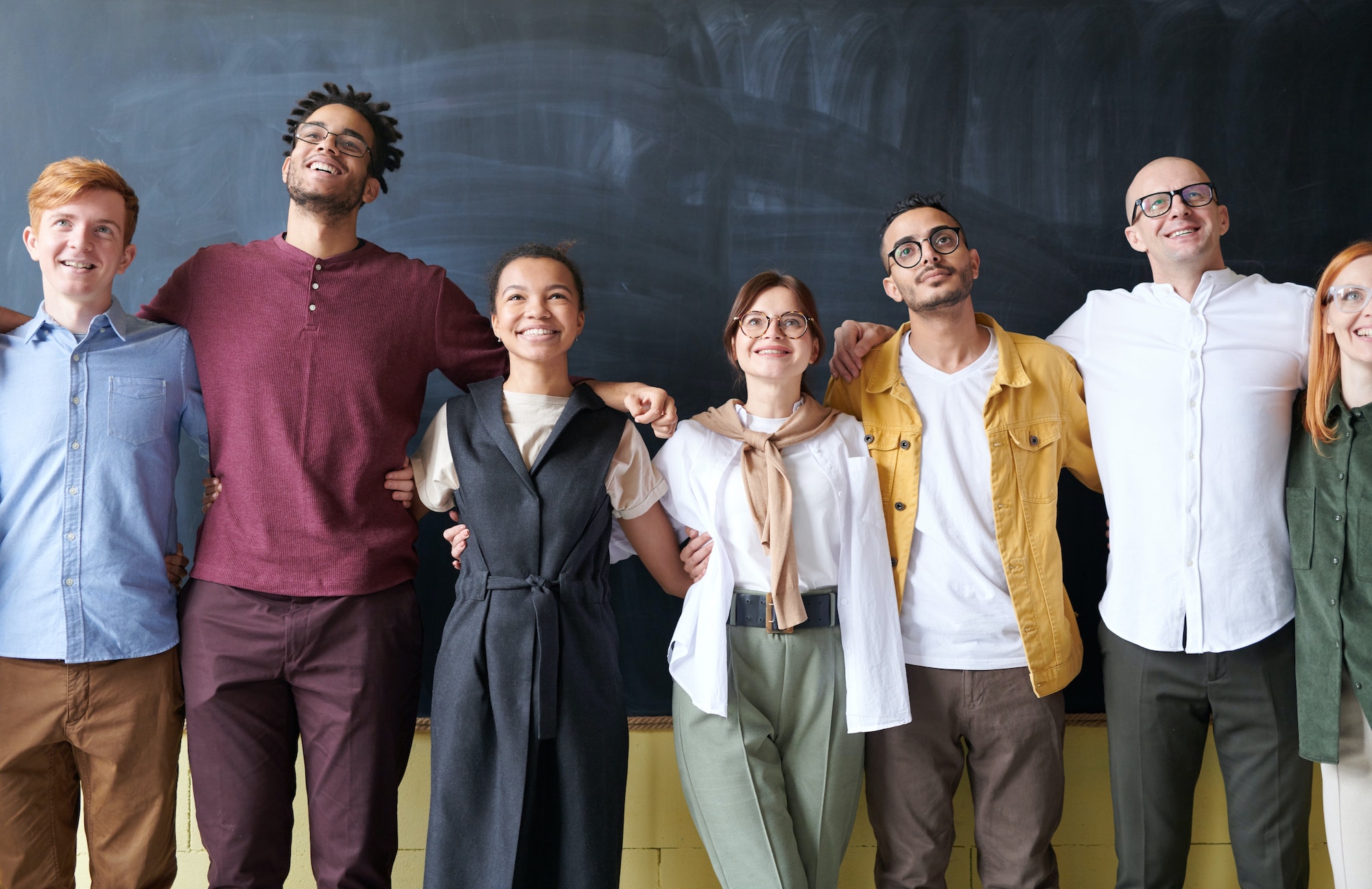 People in front of a blackboard