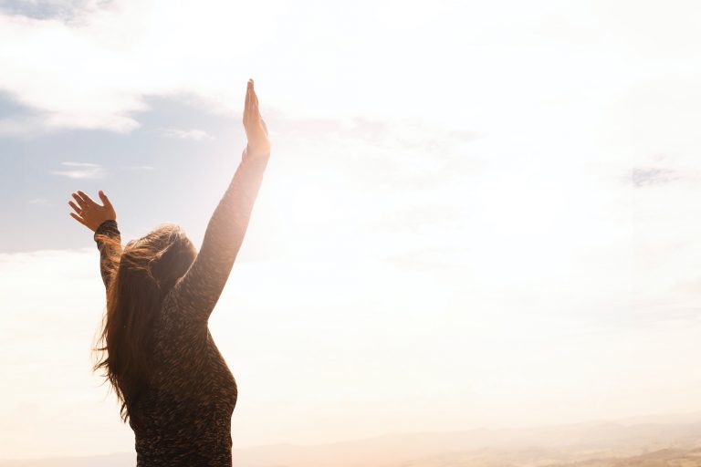 Woman raising hands