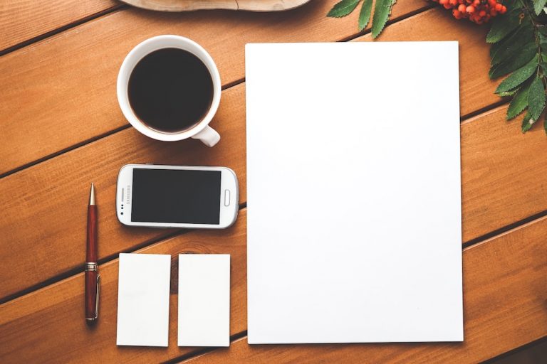 coffee mug and blank paper