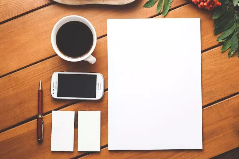 coffee mug and blank paper