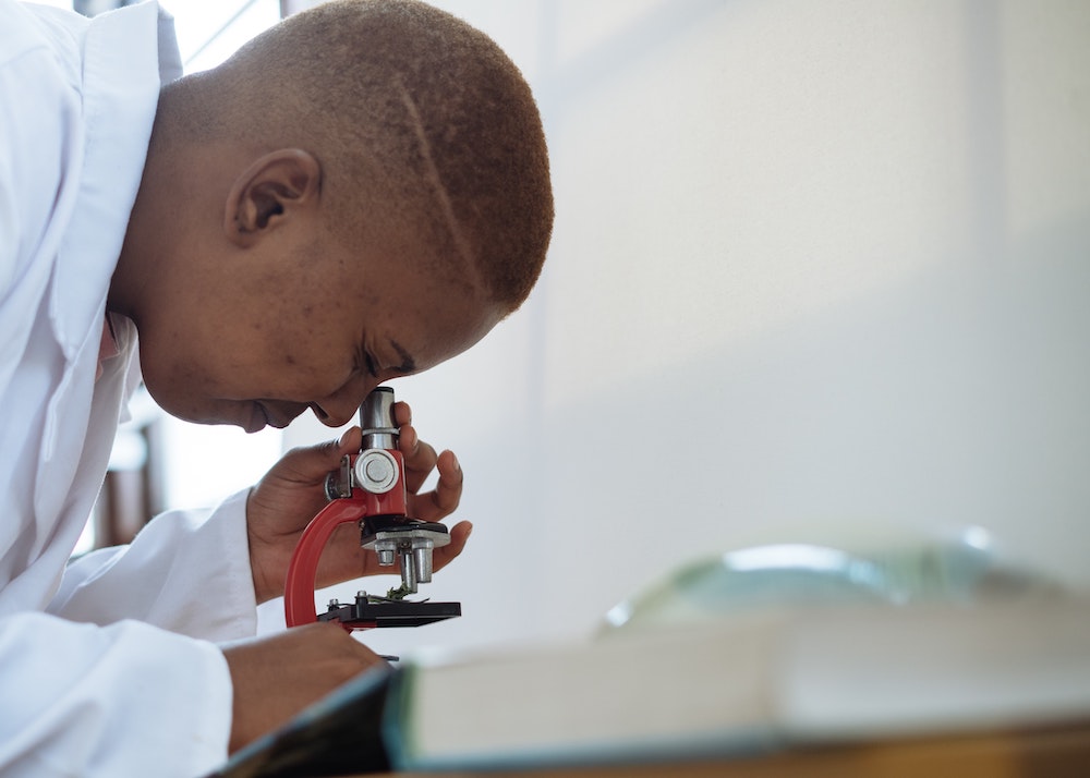 Doctor with microscope
