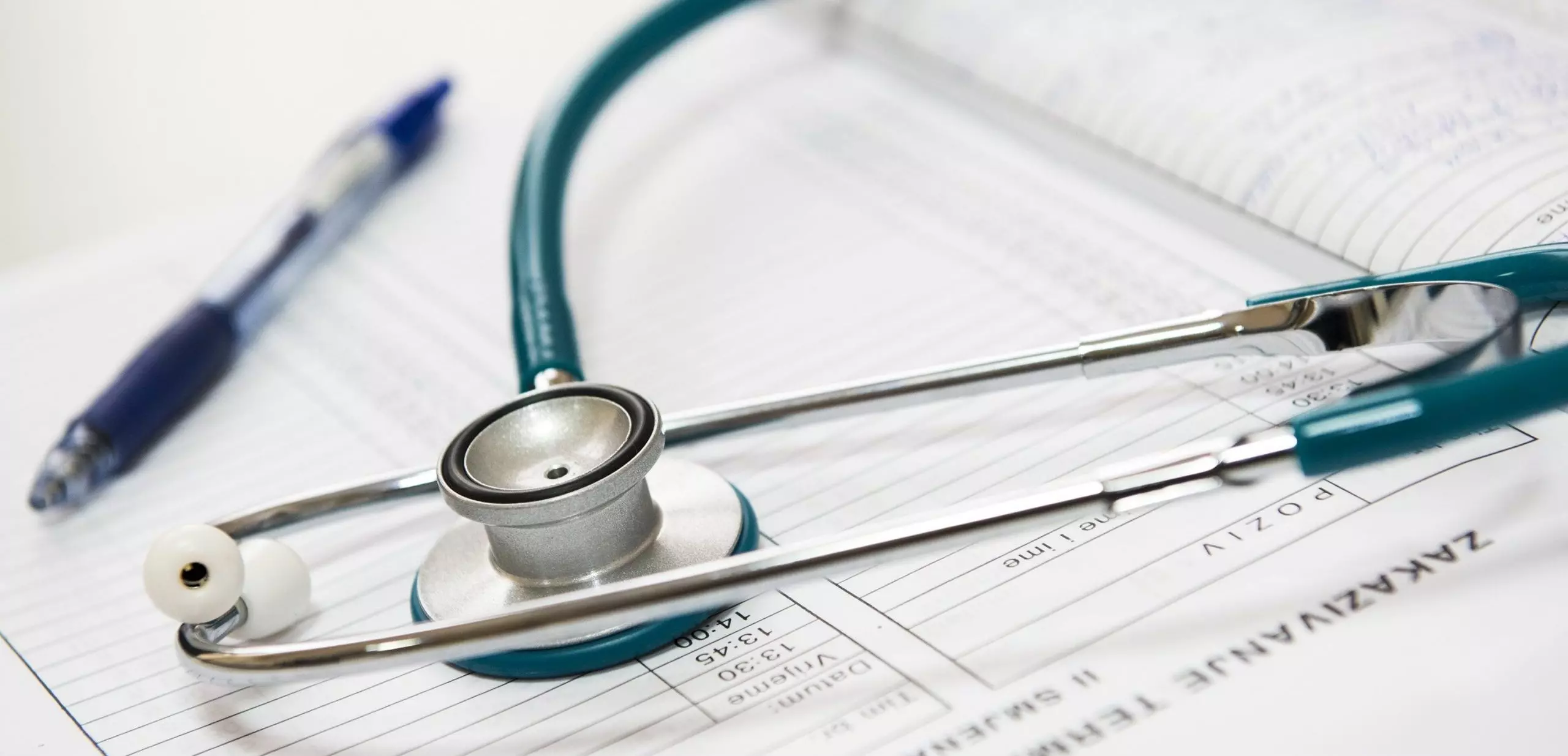 stethoscope and pen