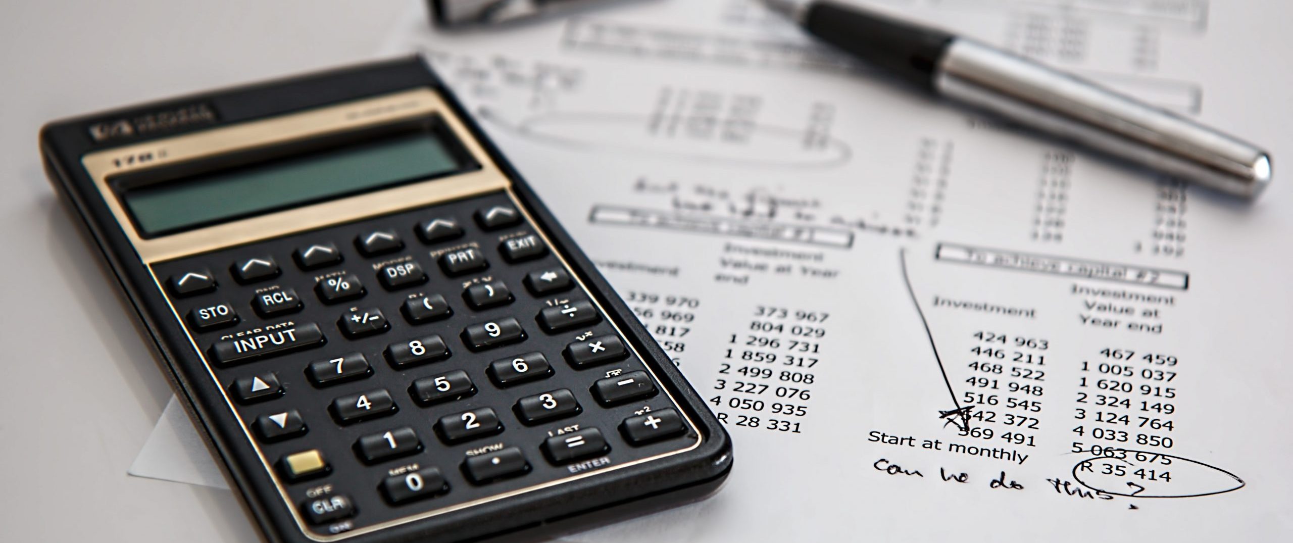 IRS Criminal Investigation: Talking Taxes And The Law With Chief Jim Lee calculator and figures