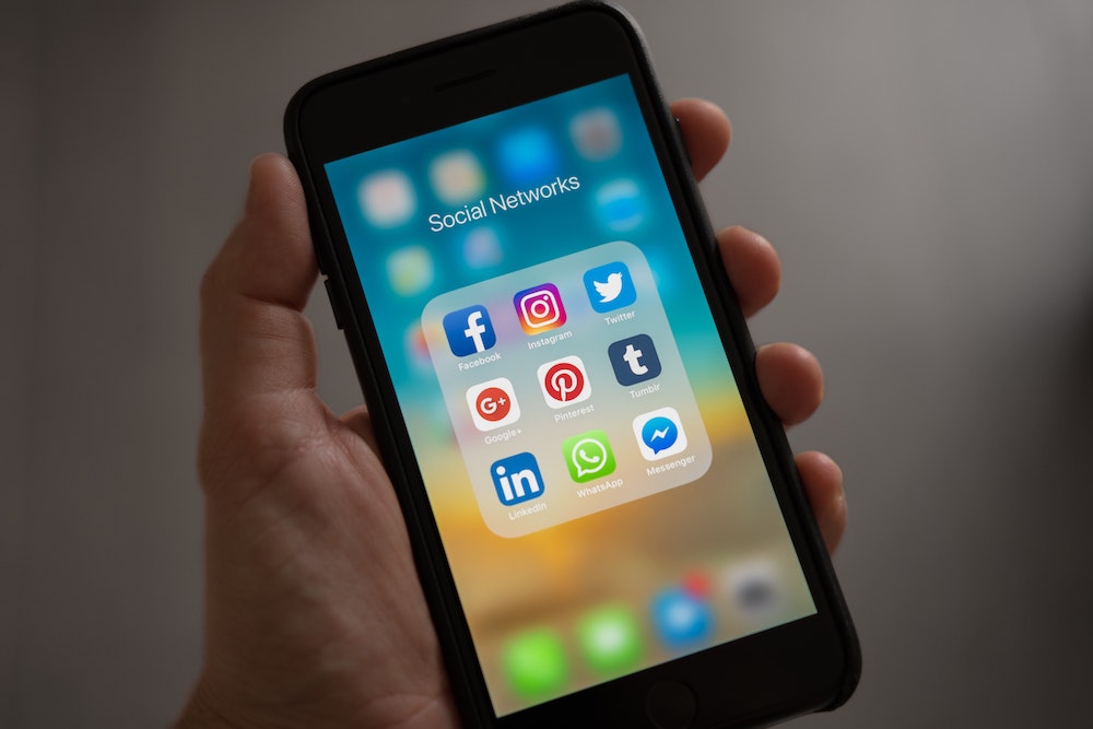 What’s Section 230 And What Does It Have To Do With The Stimulus Checks? | Taxgirl # Smart phone with social media icons