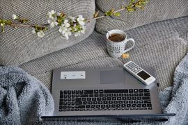 Working From Home Tax Issues: How The Coronavirus Complicates Taxes cozy home office on sofa