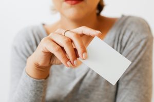 Woman with a business card