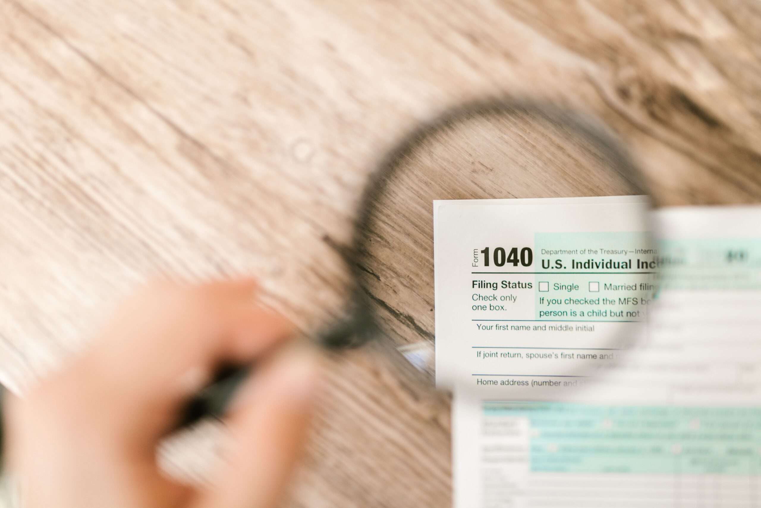 Form 1040 and magnifying glass