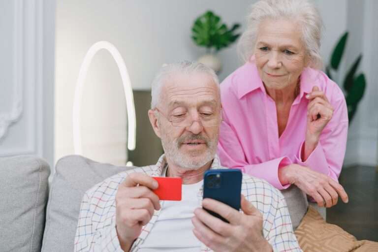 Seniors with a phone and a credit card