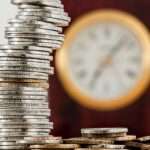 November 2026 irs rates loans & estate planning | taxgirl Coins and a clock to show value of savings