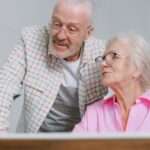 Older couple looking at a computer